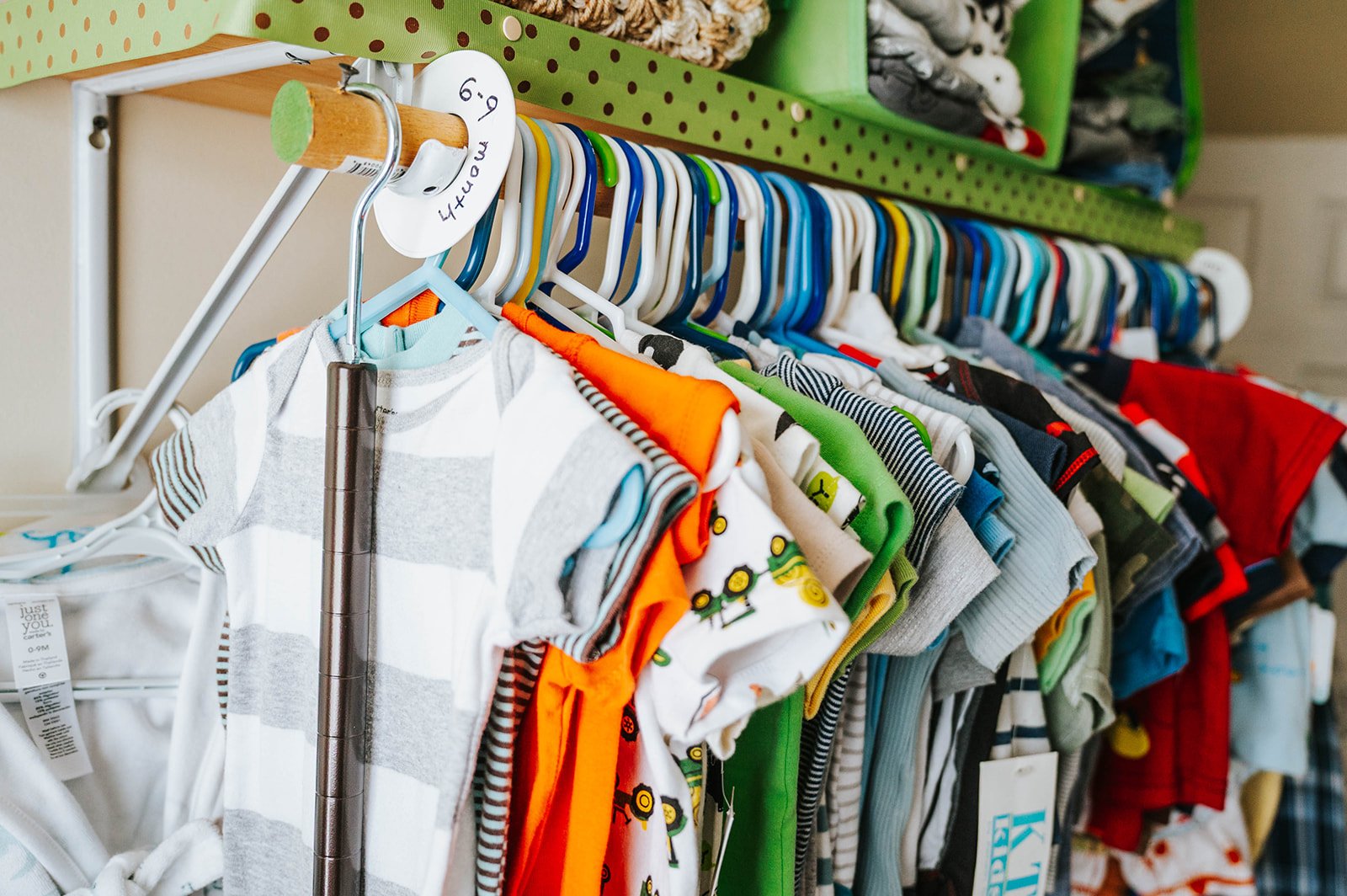 Cozy baby clothes hanging in the boutique