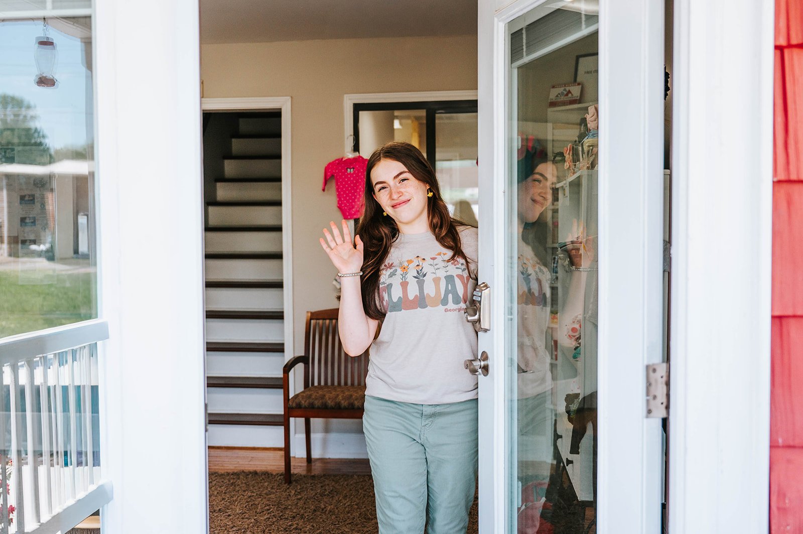 A Safe Choice volunteer welcoming a visitor at the front door